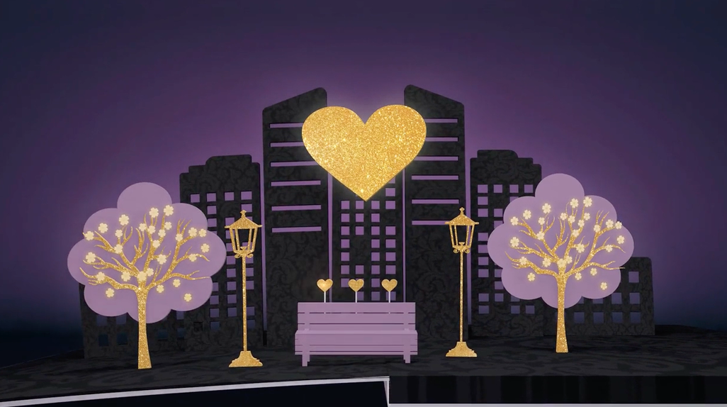 Notturno con case, alberi e un cuore dorato